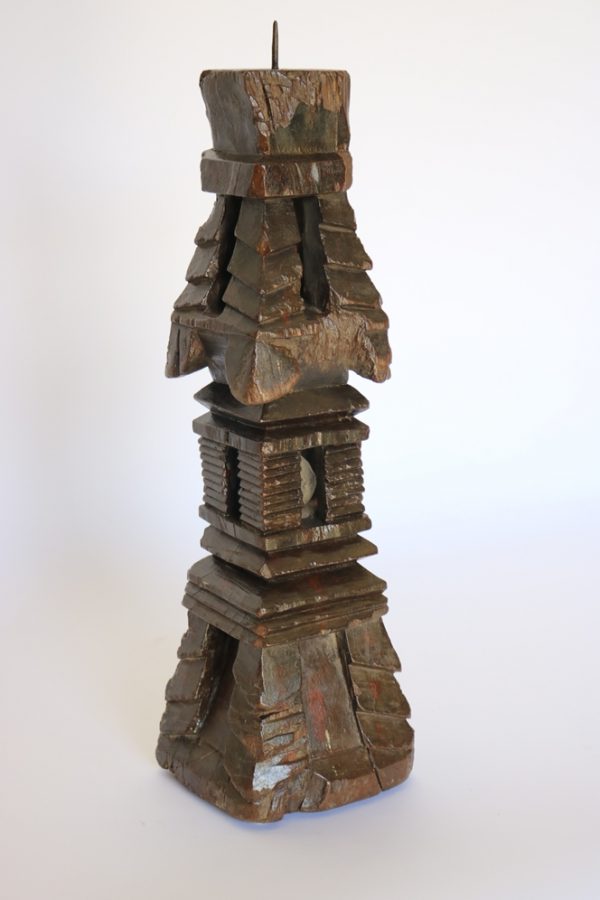 Hand carved wood candle stand from India
