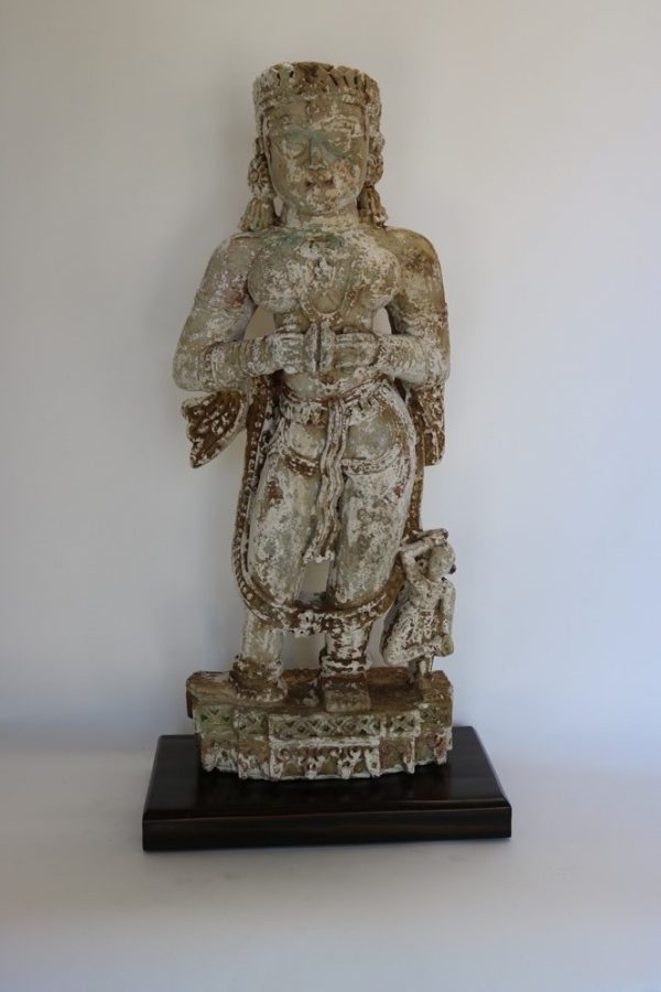 Hand carved stone statue with wood base